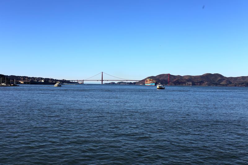 Blue bay looking toward the Golden Gate under bright clear sky.